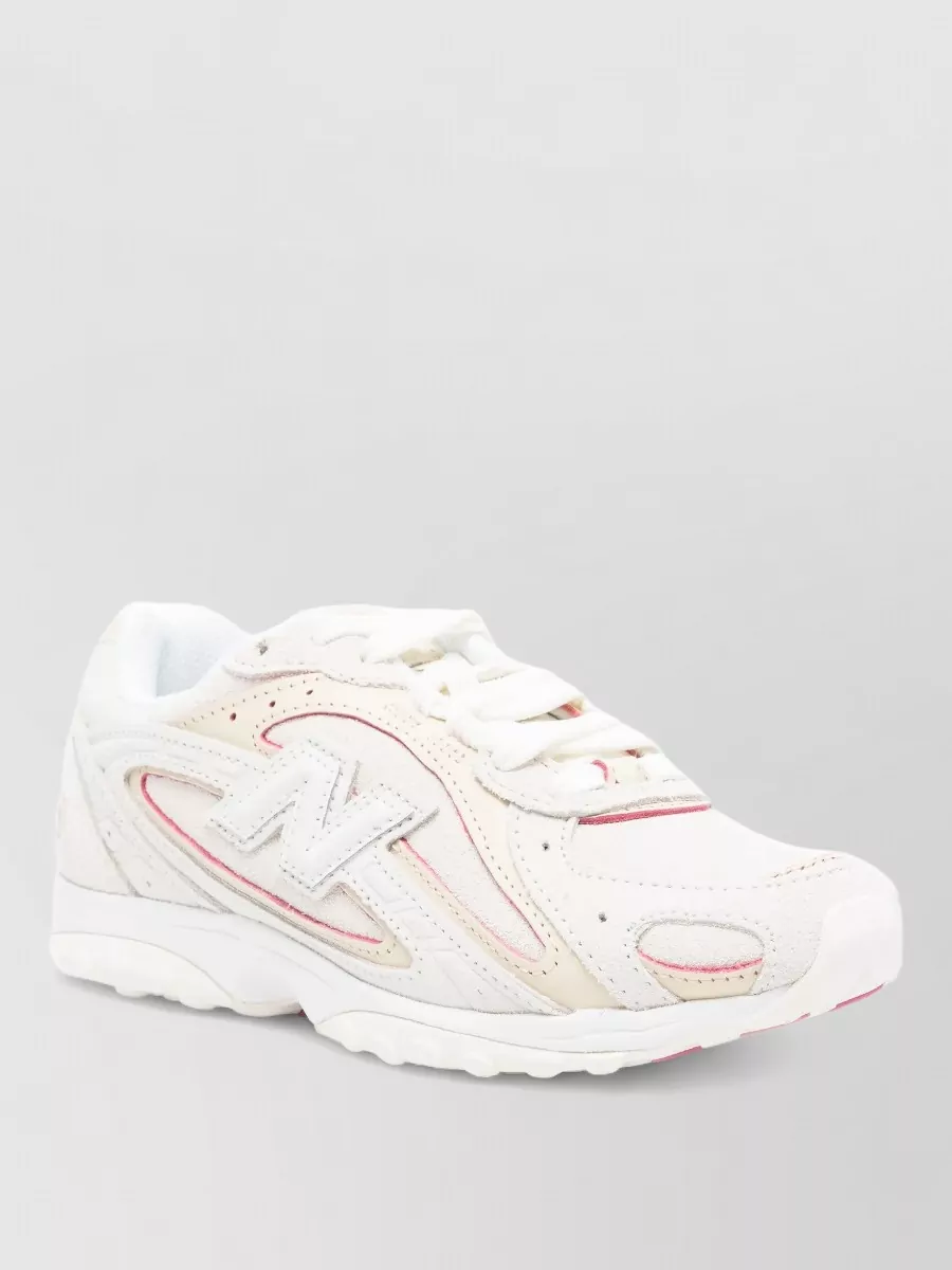 New Balance paneled low-top sneakers