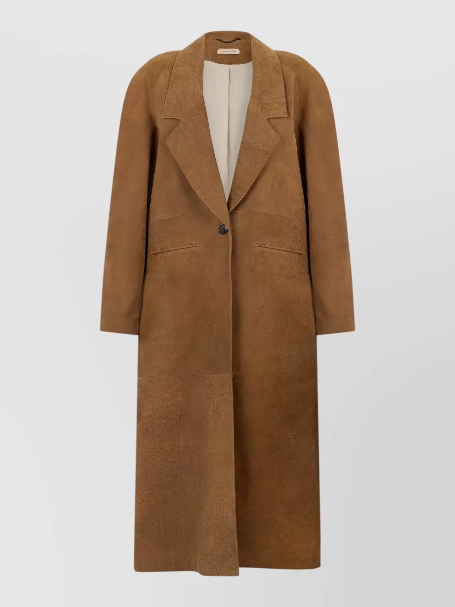 The Mannei leather long single-breasted coat
