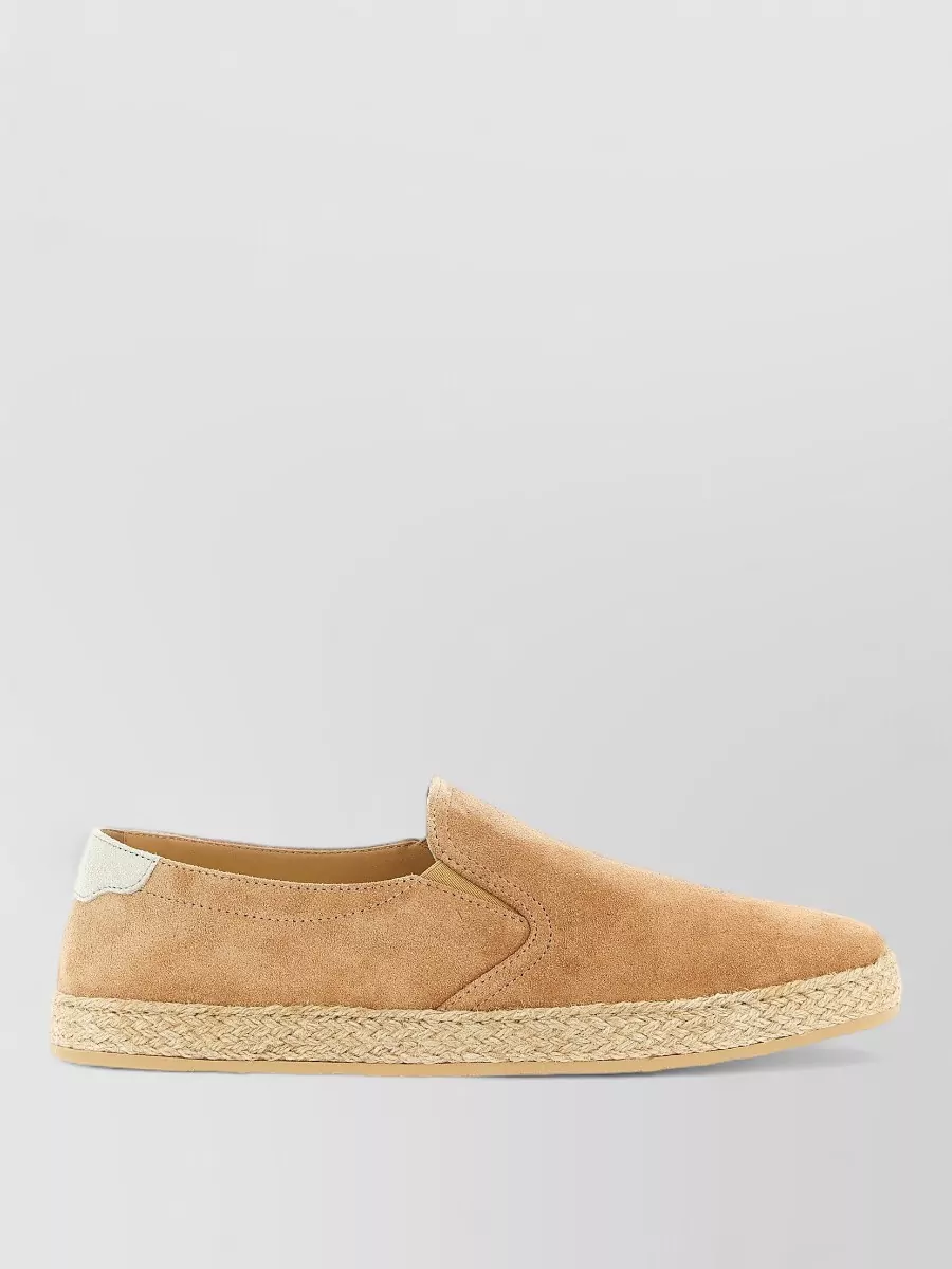 Brunello Cucinelli Suede espadrilles — Brunello Cucinelli’s camel suede espadrille in K mirrors the cardigan’s sun-baked palette, keeps the boho resort vibe, and offers a refined but easy summer silhouette with the knit shorts.