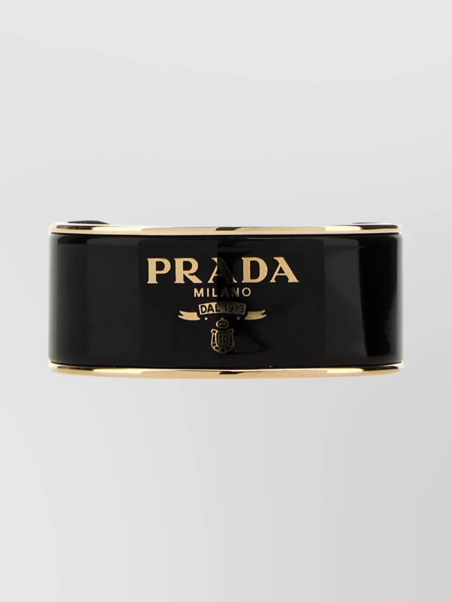 Shop Prada Streamlined Cuff Bracelet In Gold-tone Metal In Black