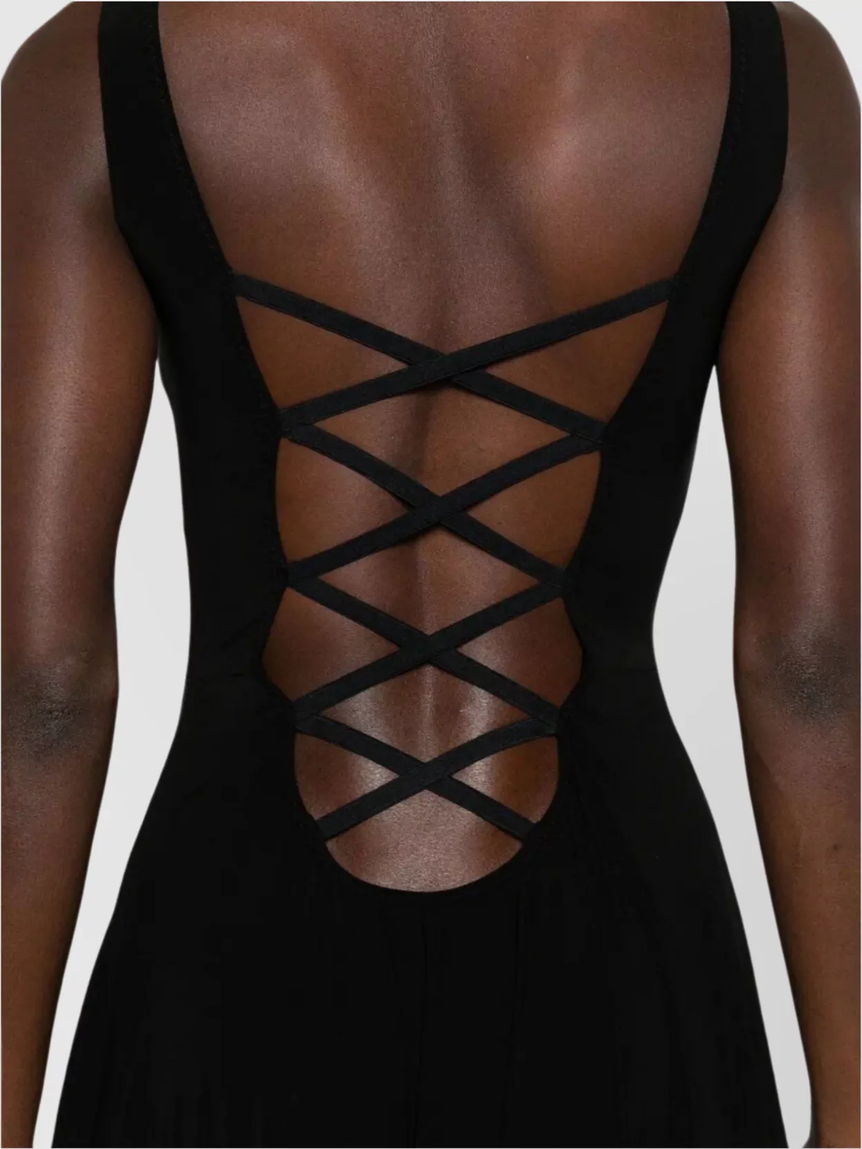 Norma Kamali Asymmetric Hem Sleeveless Evening Gown In Black