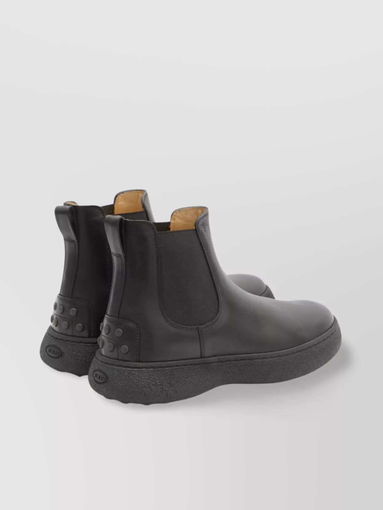 Tod's Leather Chelsea Boots With Rear Rubber Detailing In Black