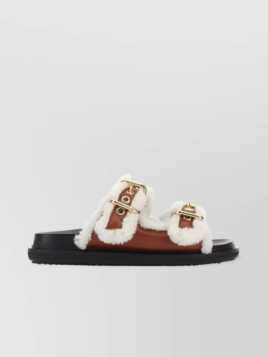Shop Marni Gold-tone Buckle Shearling Slides In Brown