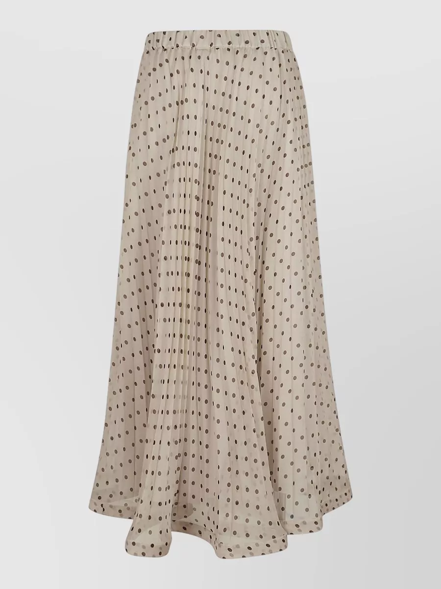 Parosh Pleated polka-dot skirt — The clean mocha wide leg quietly supports the blouse’s emerald paisley and brown border, keeps the focus on the top, and stays within the same relaxed, boho Parosh universe.