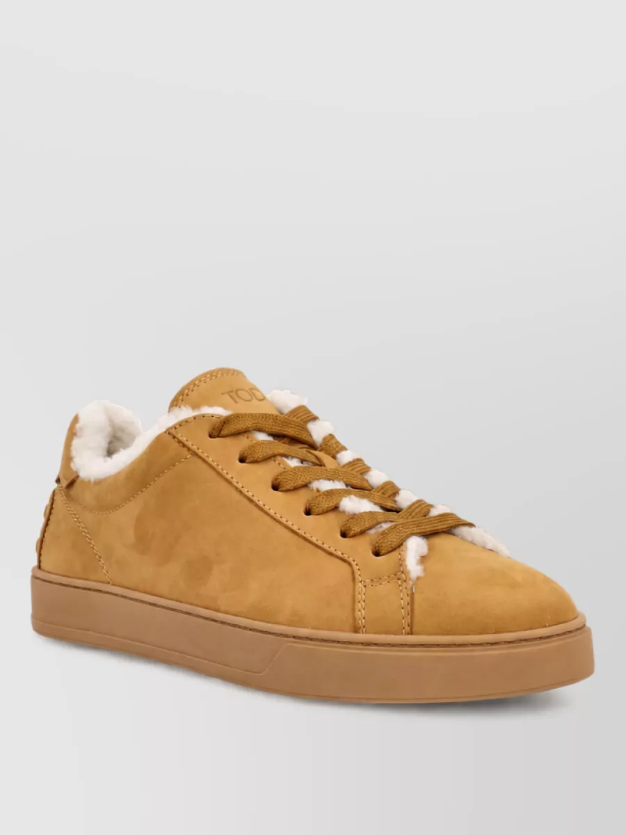 Tod's leather low top lace-up sneakers