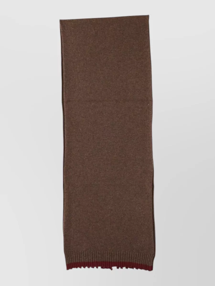 Uma Wang Cashmere scarf — The Uma Wang scarf quietly ties in the burgundy while the chestnut softens the head-to-toe tone and adds a cocooning FW layer without disrupting the minimalist line.
