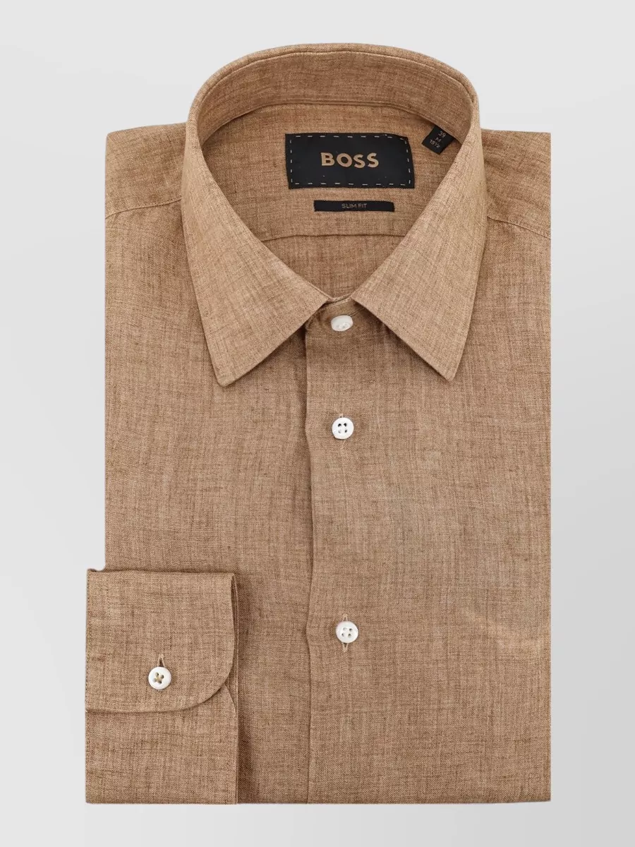 Boss Linen slim-fit long-sleeve shirt — The camel BOSS shirt echoes the belt’s tan interior and keeps the palette soft and minimalist while still smart enough for polished spring days.