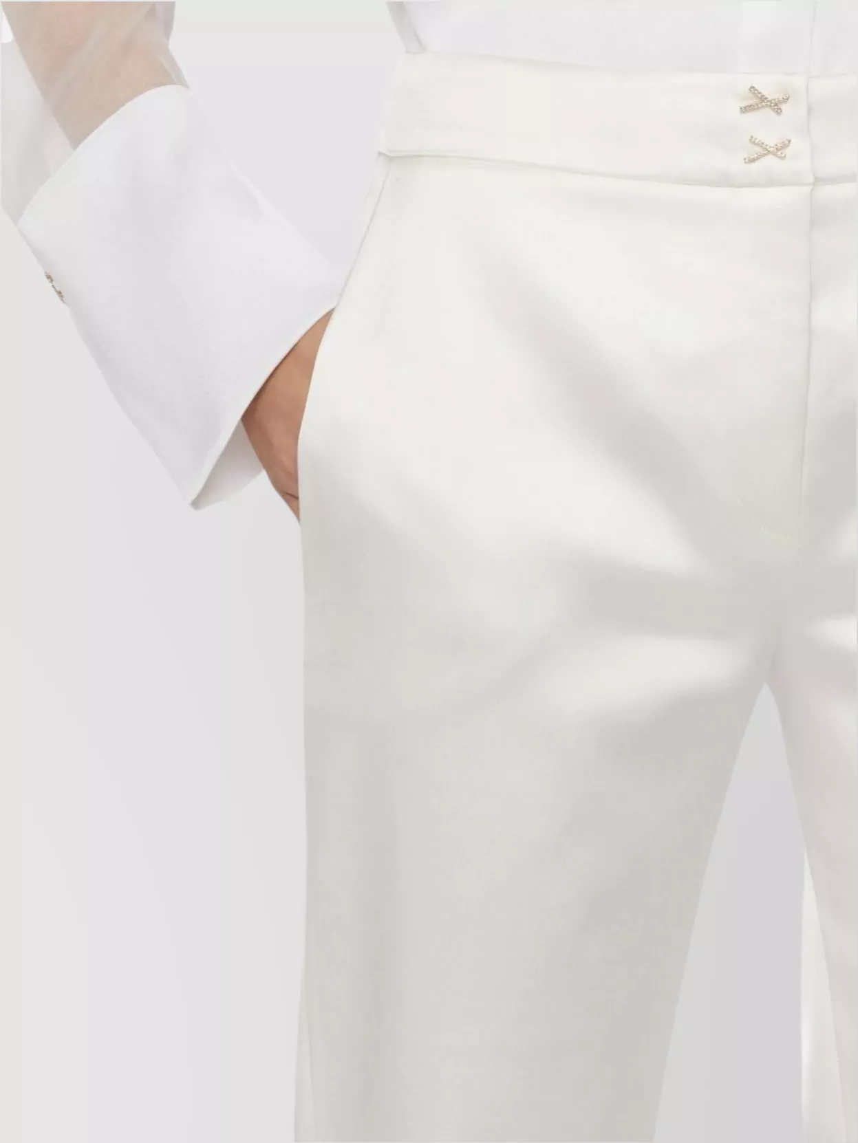 Genny Satin Trousers With Button Detail And Flared Leg In White