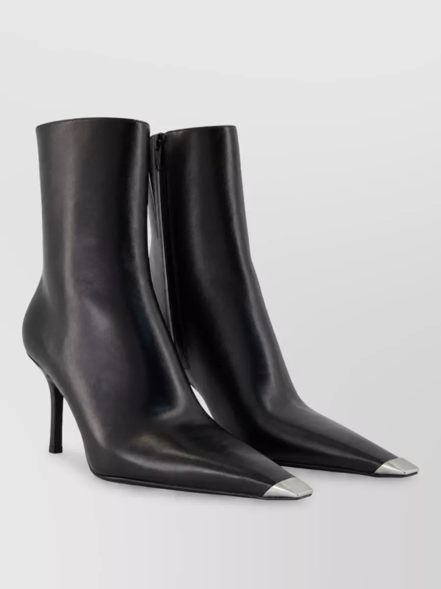 Alexander Wang Leather ankle boots — The Alexander Wang metal-capped ankle boots echo the jacket’s silver zip and slim line, keeping the mood razor-tailored and night-ready without adding bulk.