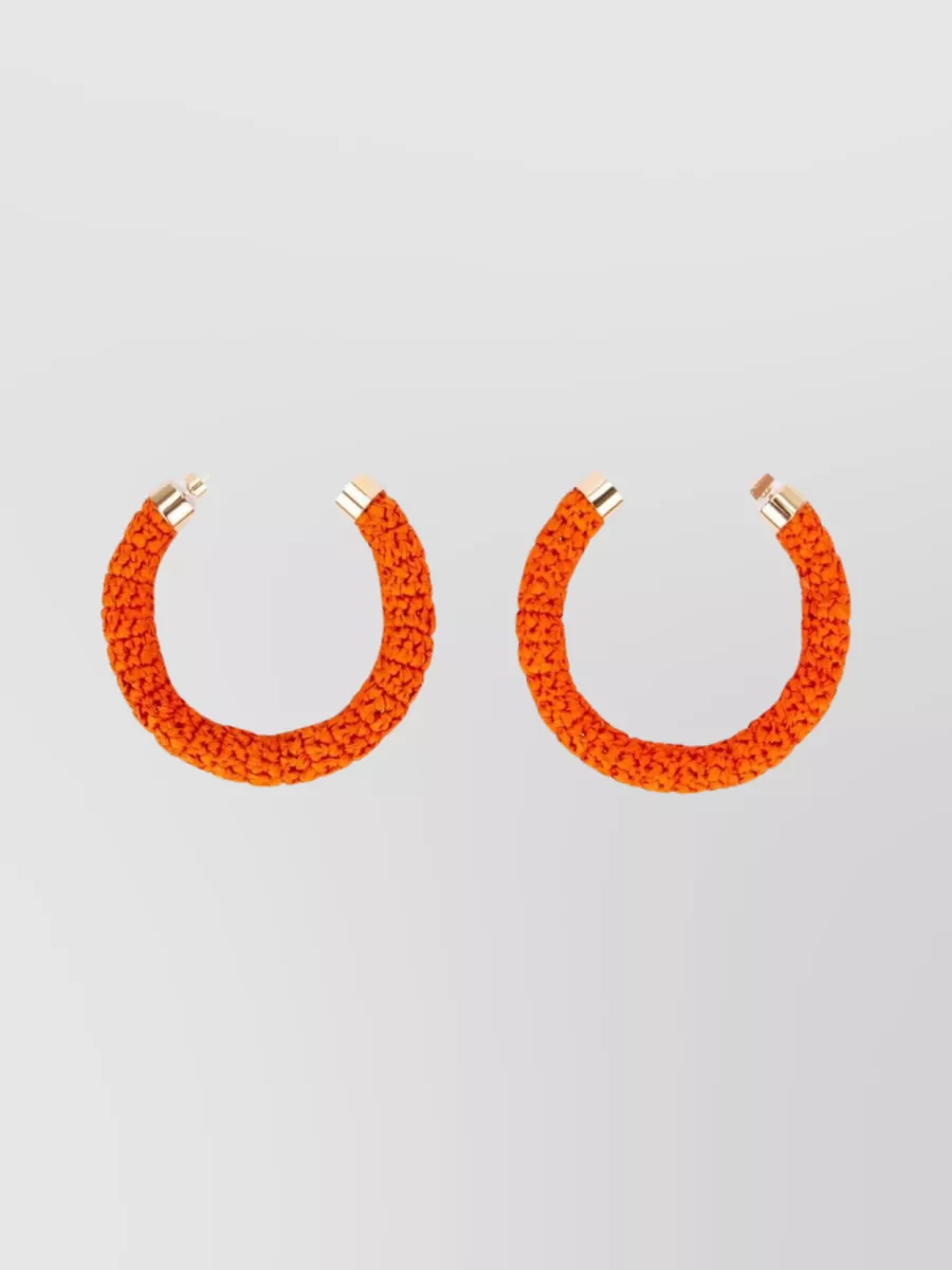 Shop Jacquemus Textured Circular Hoop Earrings In Orange