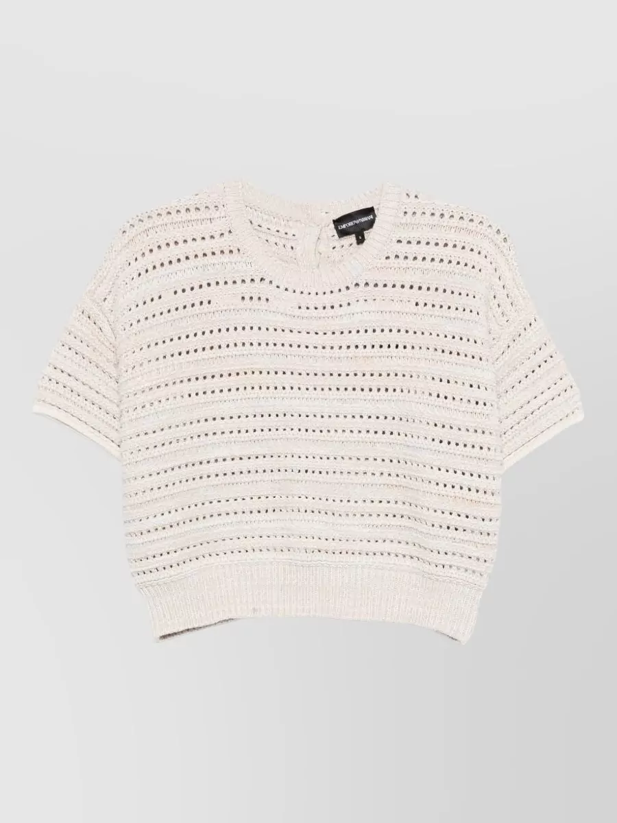 Emporio Armani Cotton open-knit short-sleeve cardigan — The navy and soft white cropped knit mirrors the short’s relaxed volume and sport-minimal mood while keeping within the same Emporio Armani, quiet luxury universe.
