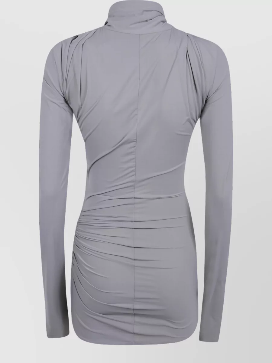 Entire Studios Stretch jersey top — The fitted ruched grey top keeps the volume of the wide-leg technical trouser in check while matching the cool palette and maintaining a clean, slightly dressier streetwear mood.