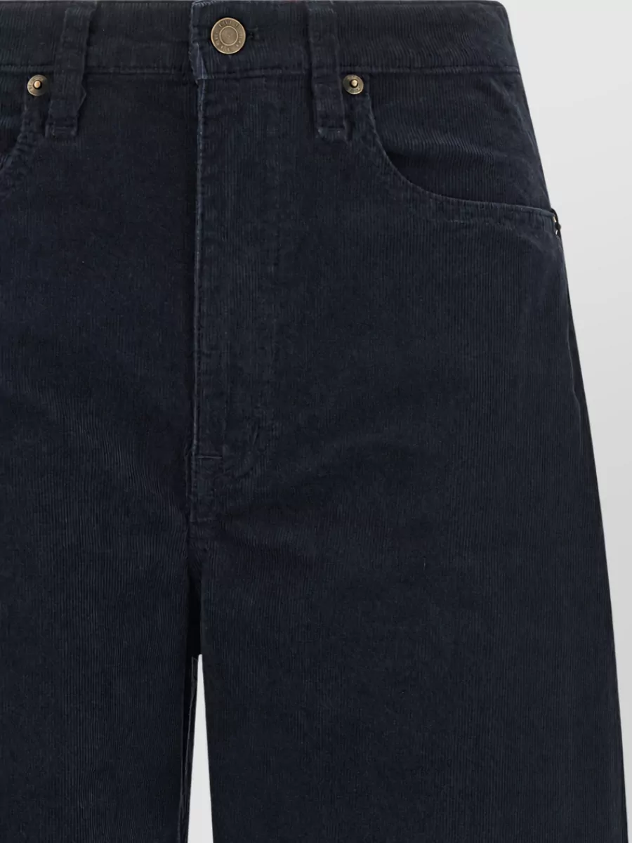Lauren Ralph Lauren Corduroy high-rise wide-leg trousers — The deep navy wide-leg cord from Lauren Ralph Lauren keeps the outfit casual-sporty, tonally aligned with the coat, and balances the fitted top with a fuller, winter-appropriate silhouette.