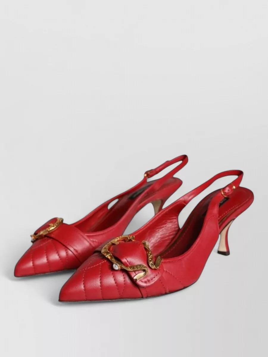 Dolce&Gabbana Leather slingback sandals — The black and deep-red kitten-heel slingbacks echo the dress’s romantic florals while their lower heel and darker base ground the print without introducing competing colors.