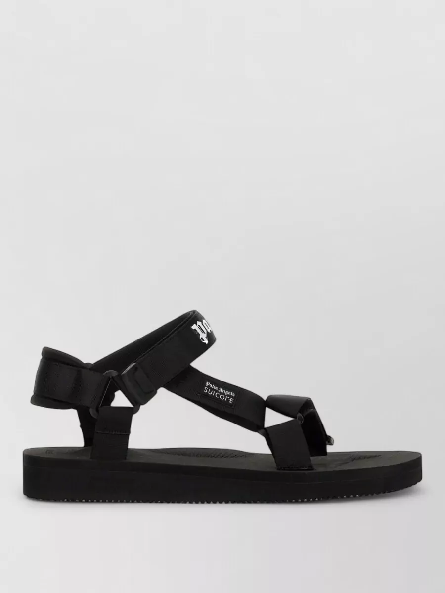 Palm Angels logo slides