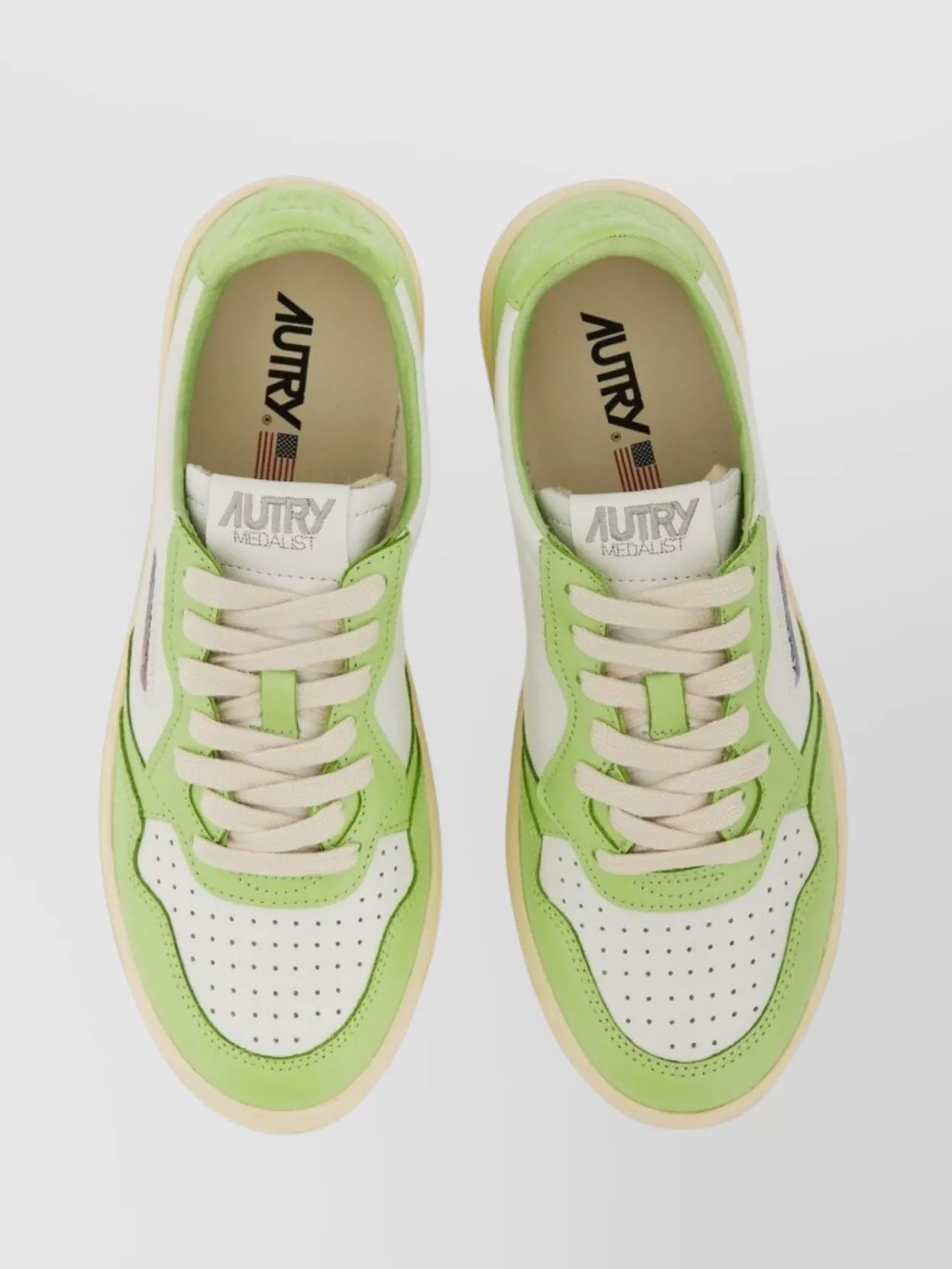 Autry Low Sneaker With Contrast Sole And Perforated Toe