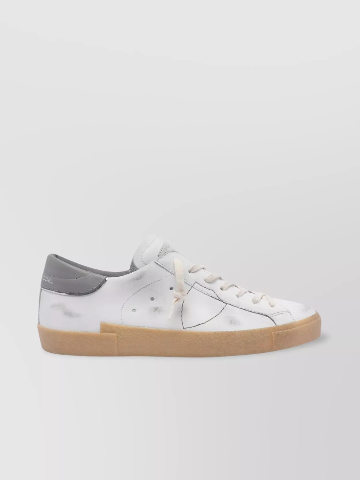 PHILIPPE MODEL LEATHER LOW TOP SNEAKERS WITH PERFORATED ACCENTS