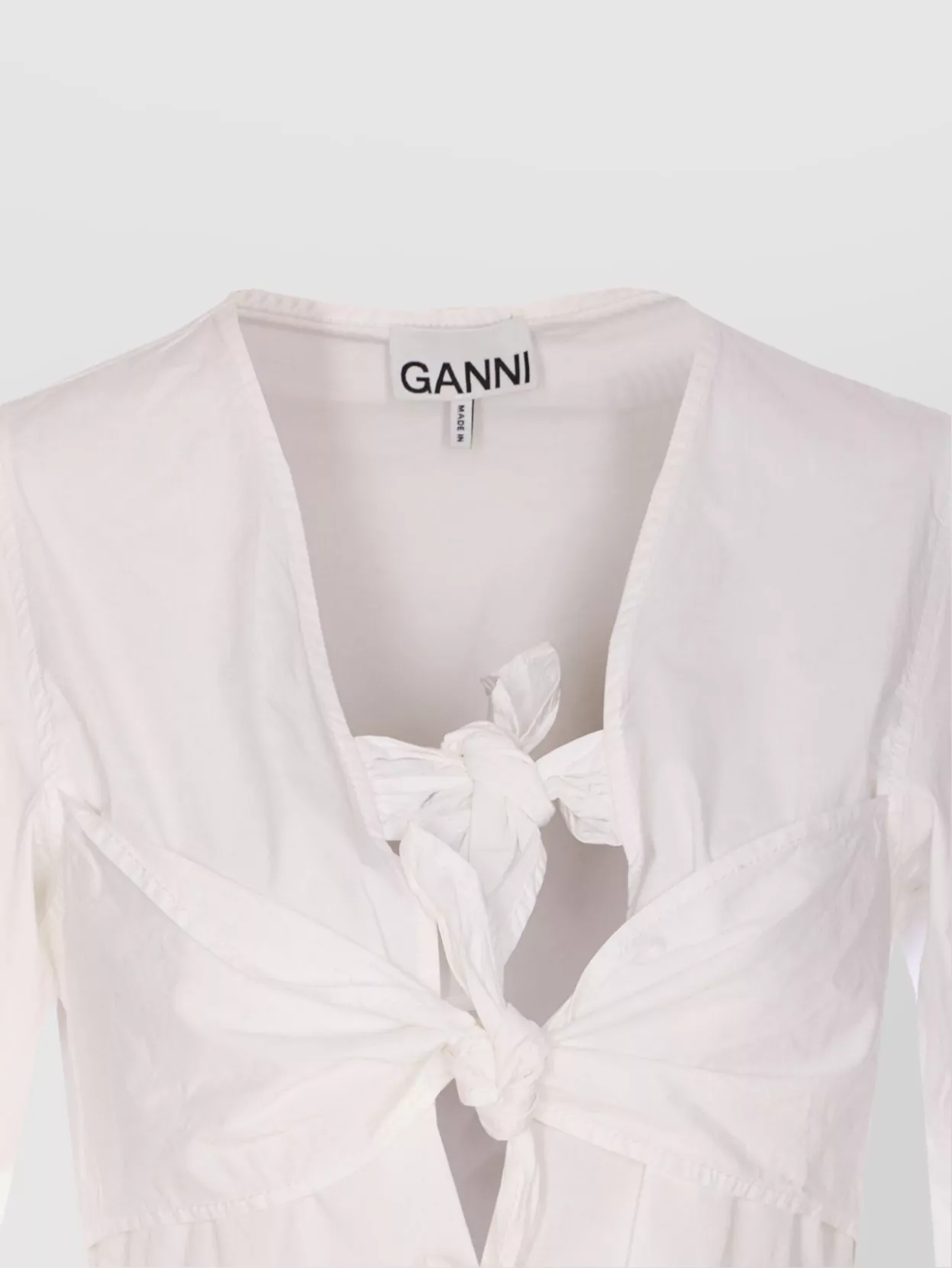 Ganni Oversize Puff Sleeve Peplum Bow Top