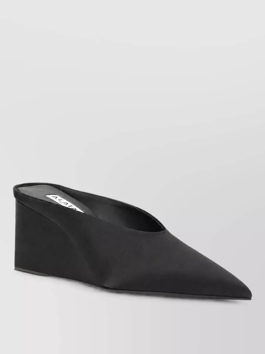 Alaïa satin wedge mules