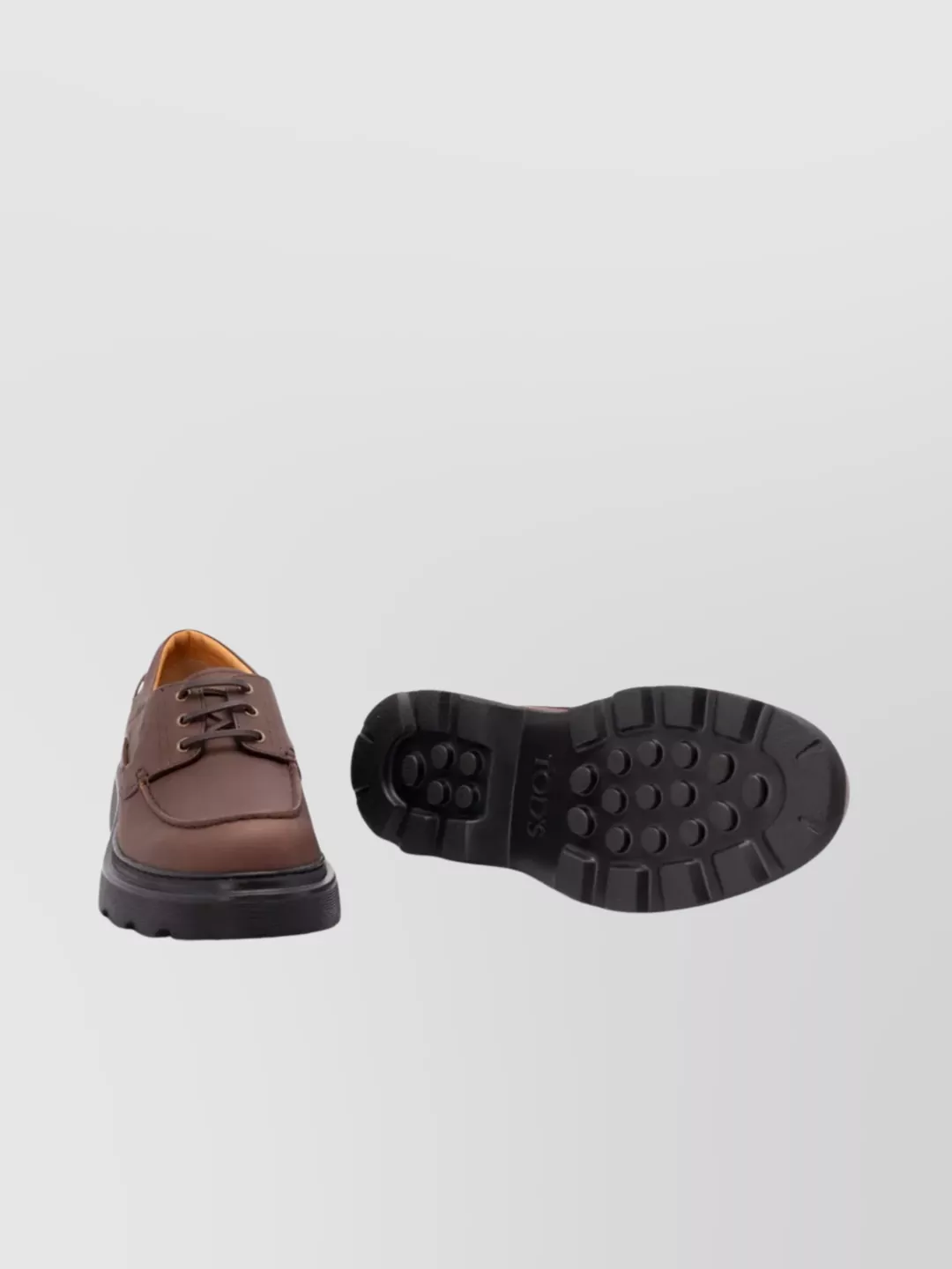Tod's Boat Shoes With Chunky Sole And Eyelet Detailing