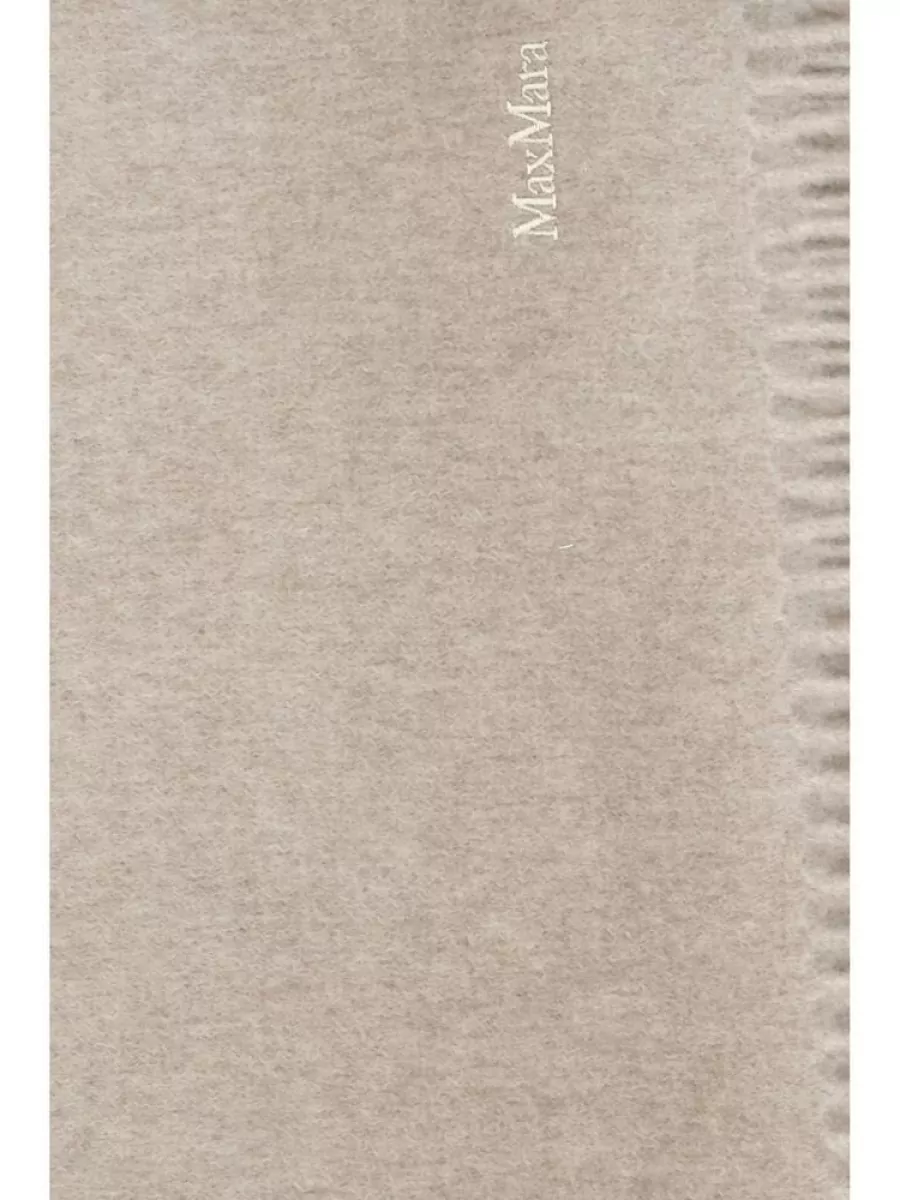 Max Mara Cashmere scarf — The brushed beige Max Mara scarf softly bridges ivory and cognac tones, adding warmth and a barely-there logo detail that suits the understated, relaxed proportions.