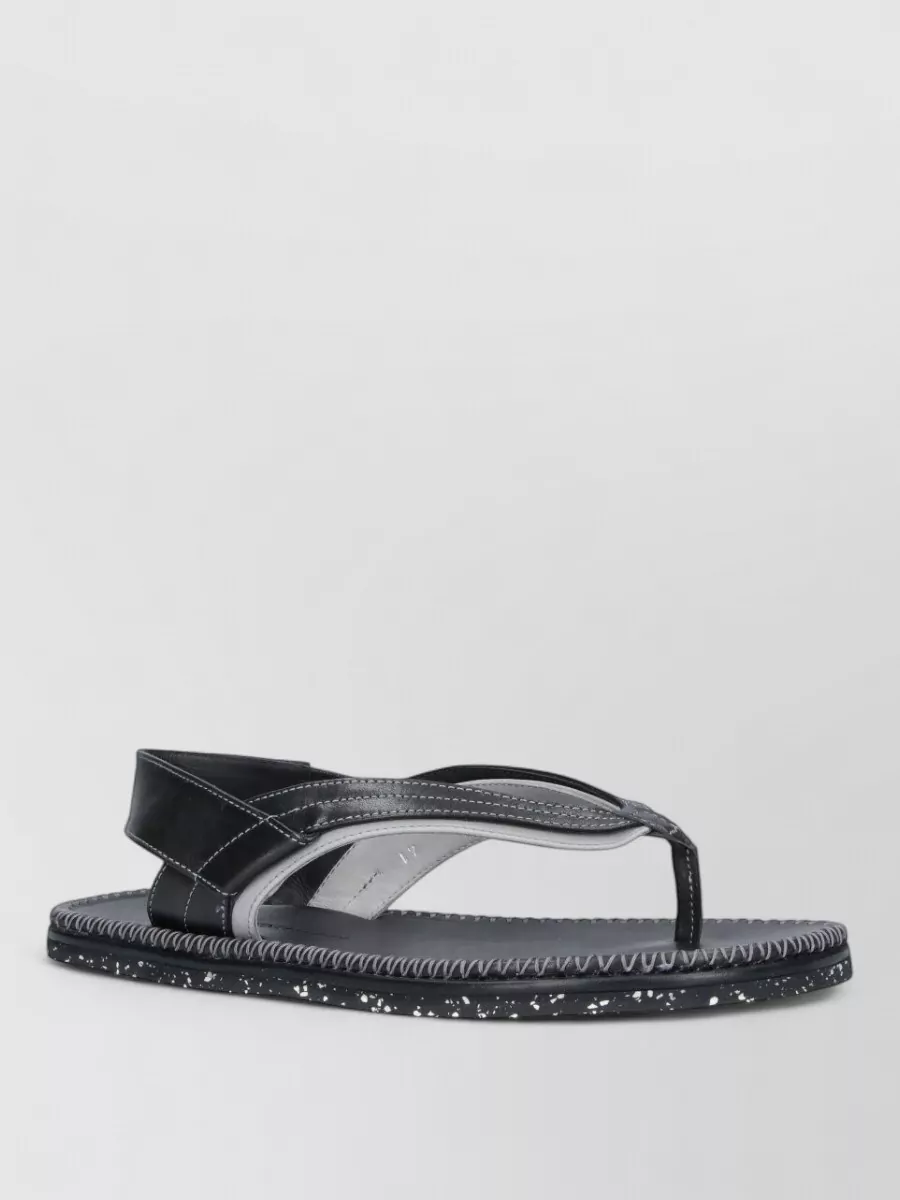 Kiko Kostadinov leather slides
