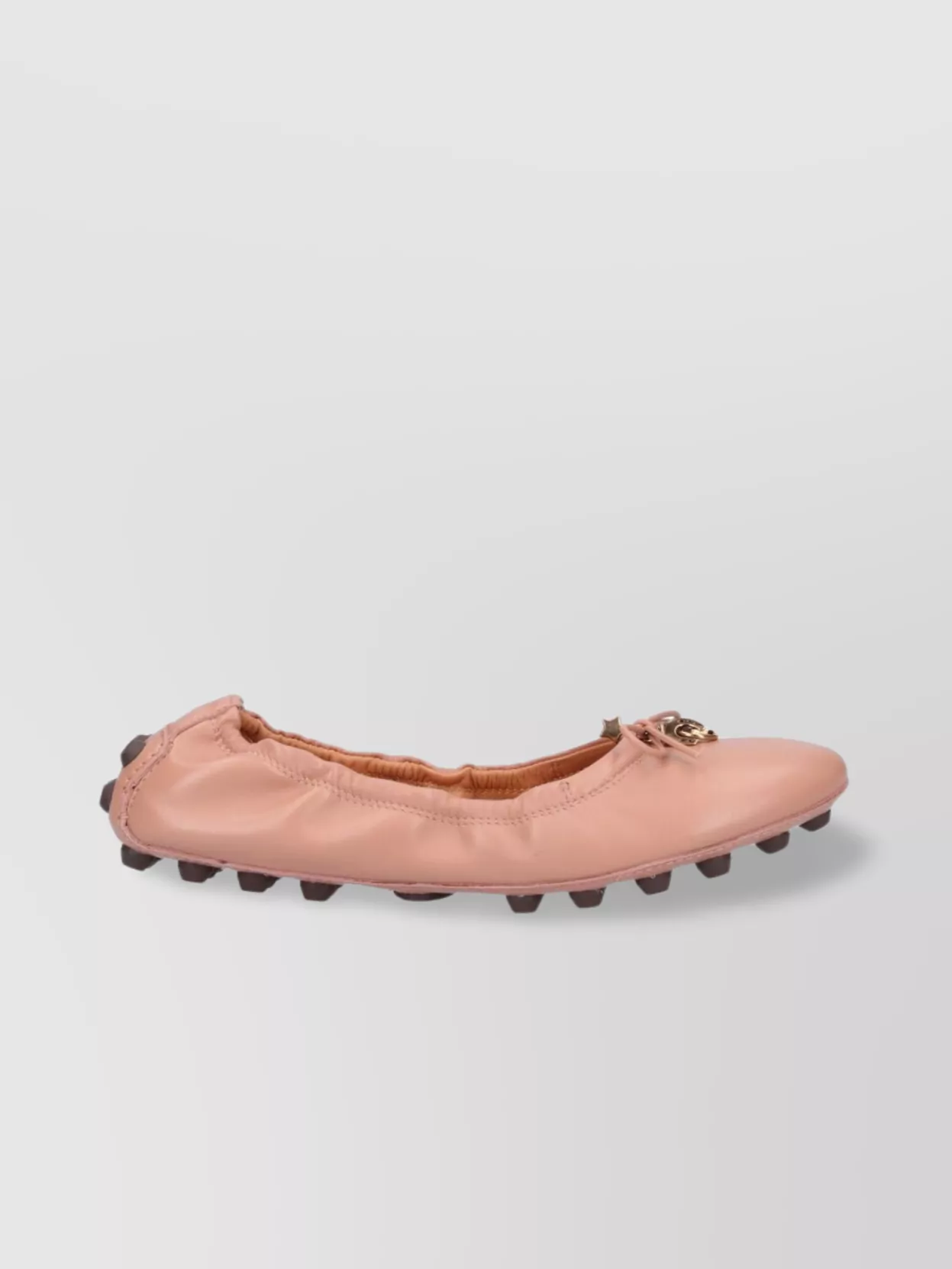 Shop Tod's Round Toe Ballerina Shoes With Bow And Charm Detail In Pink
