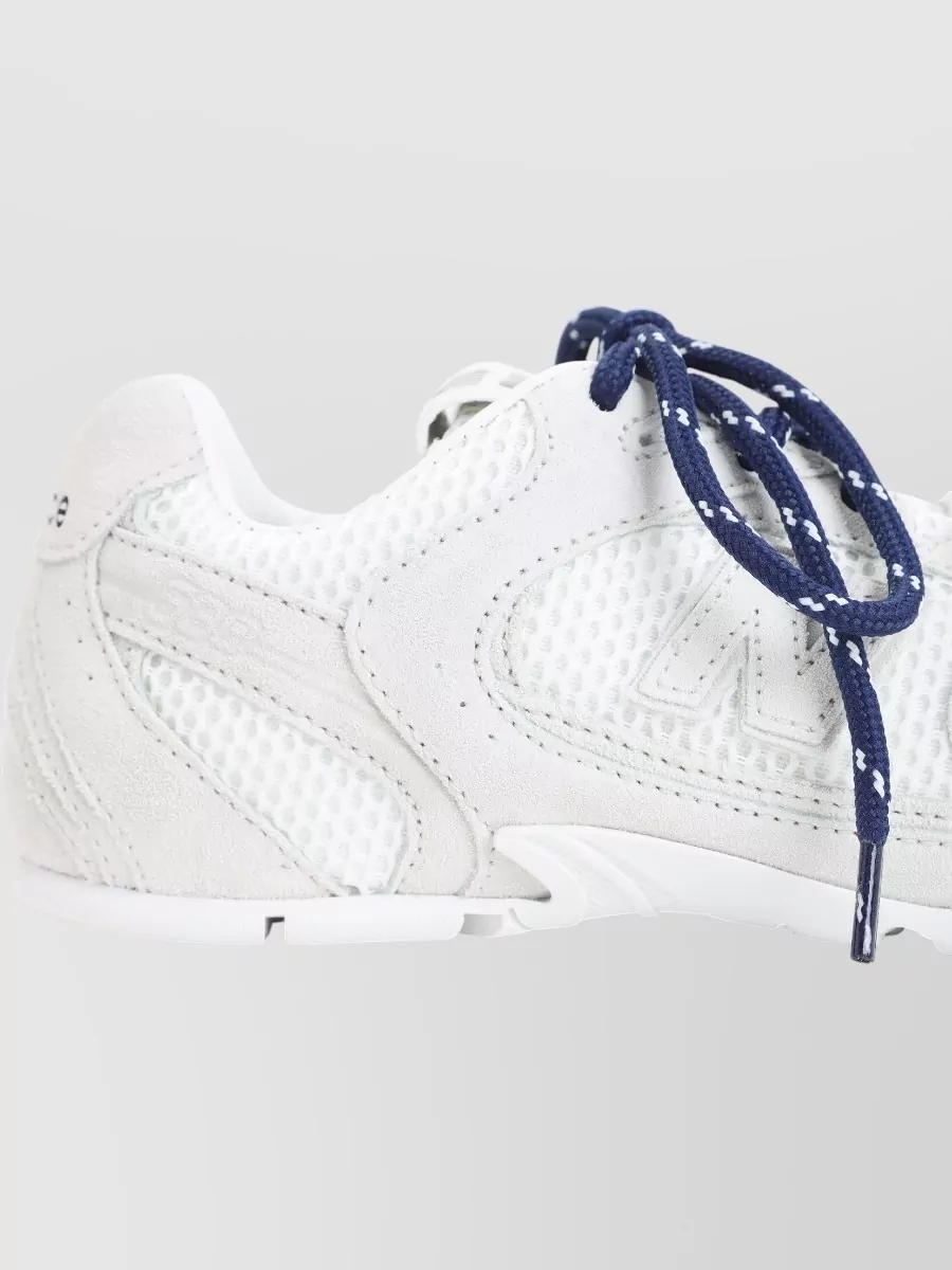 Miu Miu Stylish Sneakers With Unique Lacing Design