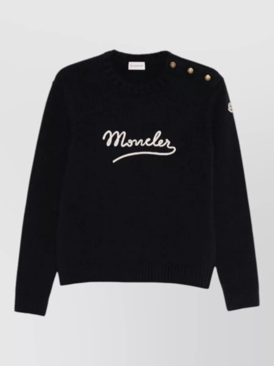Moncler Crew neck jumper — The cropped navy drawstring polo sits neatly at the waist and echoes the trouser’s deep navy for a sleek, tonal sport-luxe column that keeps the wide leg balanced and modern.