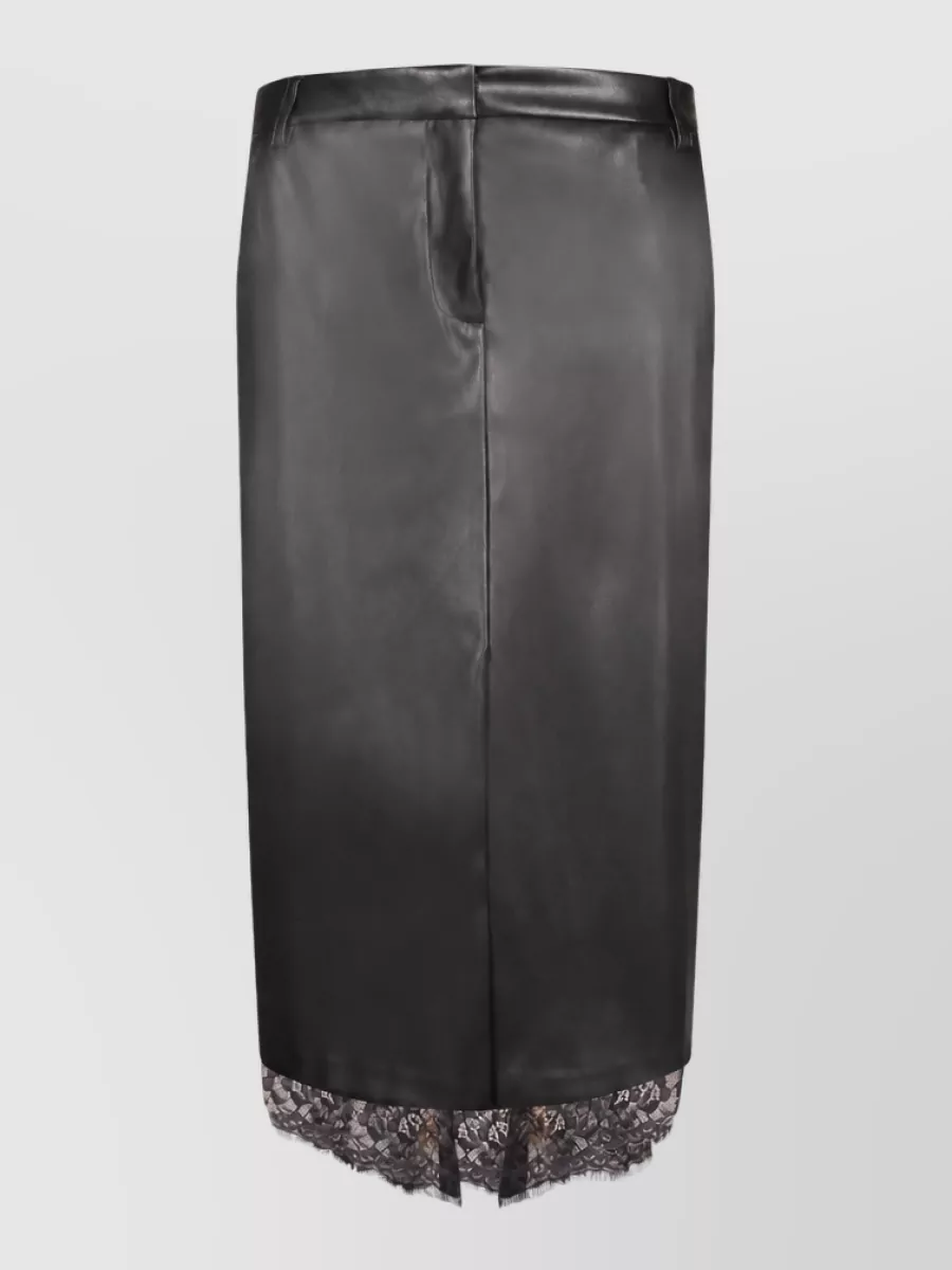 Ermanno Firenze Pencil skirt — The Ermanno Firenze black pencil skirt with lace hem directly echoes the lace collar of the polo and keeps the outfit romantic, polished, and city-dinner appropriate in a clean column silhouette.