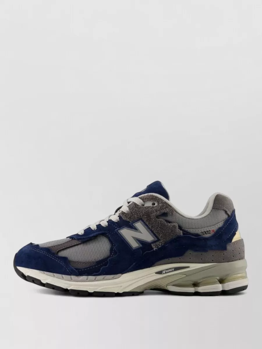 New Balance Paneled Low-Top Sneakers