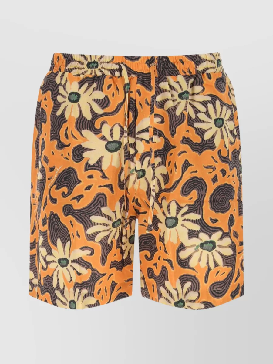 Shop Nanushka Bermuda Floral Linen Shorts In Cream