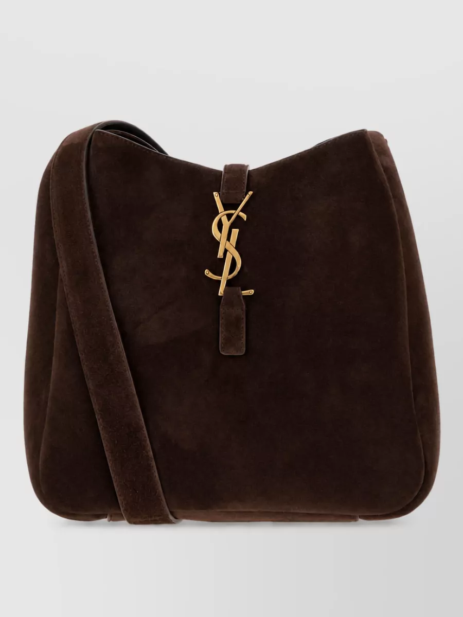 Saint Laurent le 5 à 7 suede shoulder bag — The Saint Laurent espresso suede shoulder bag continues the deep brown palette and plush texture in a more polished, structured way, tying the Margiela knit and Salomon shearling into a single quiet-luxe narrative.
