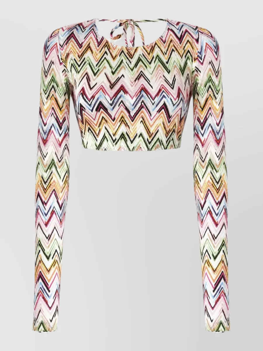 Missoni Blouse — The cropped pastel chevron top echoes the trouser’s sorbet palette and balances the wide leg with a slim, high-waist–friendly proportion for a cohesive Missoni set.
