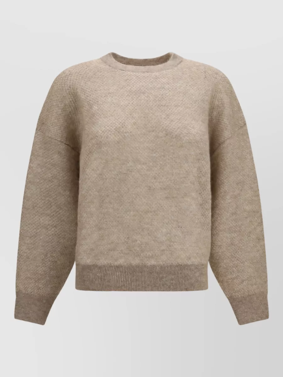 Brunello Cucinelli Open-knit mohair crewneck sweater — The warm beige sweatshirt keeps the mood relaxed-precise, bridges the chestnut trouser tone with softer neutrals, and its quiet structure matches the trouser’s easy tailoring for refined off-duty wear.