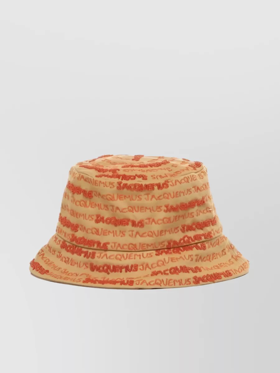 Jacquemus Embroidered Logo Defines This Bucket Hat In Beige