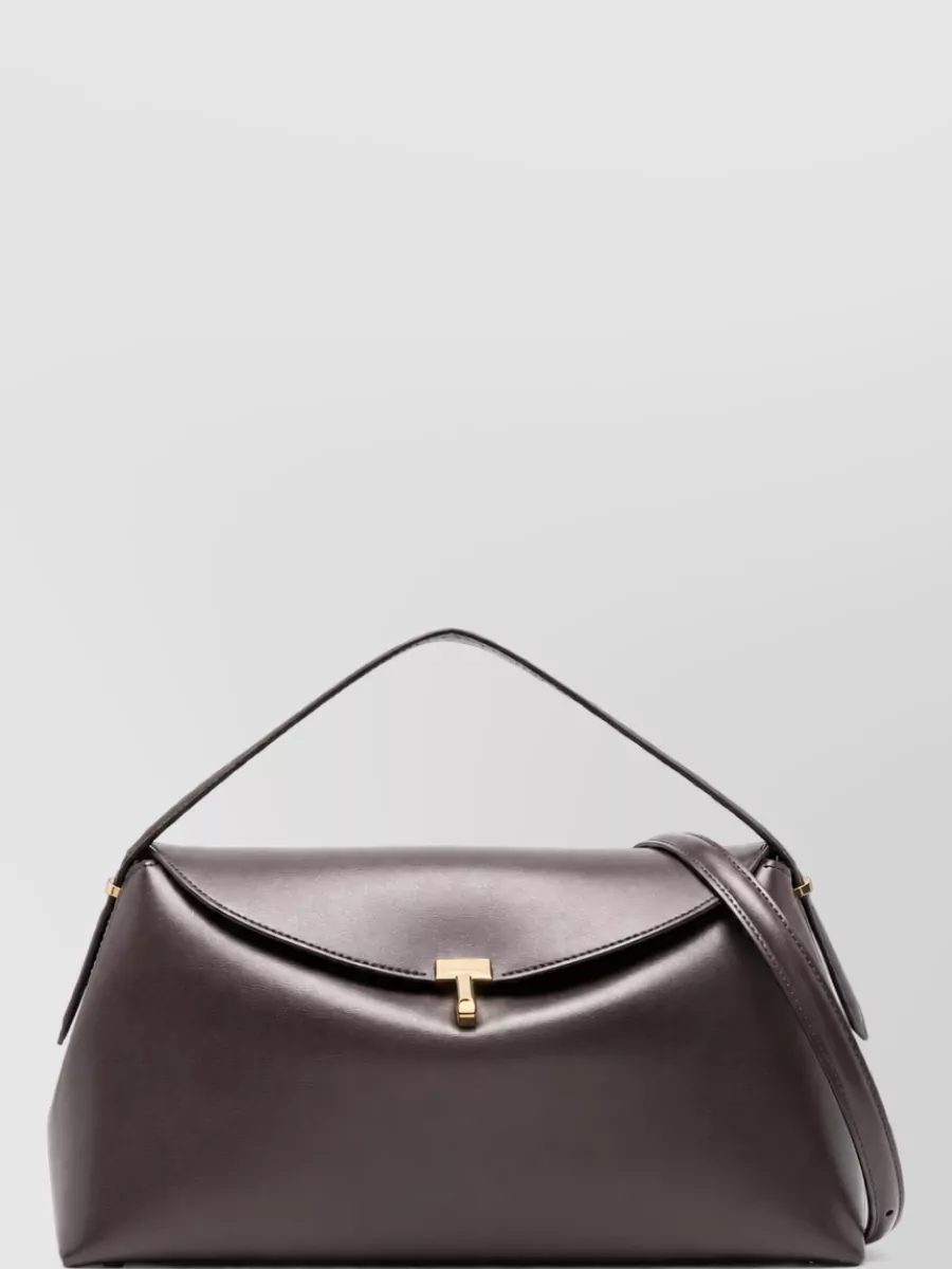 Totême leather top handle clutch bag