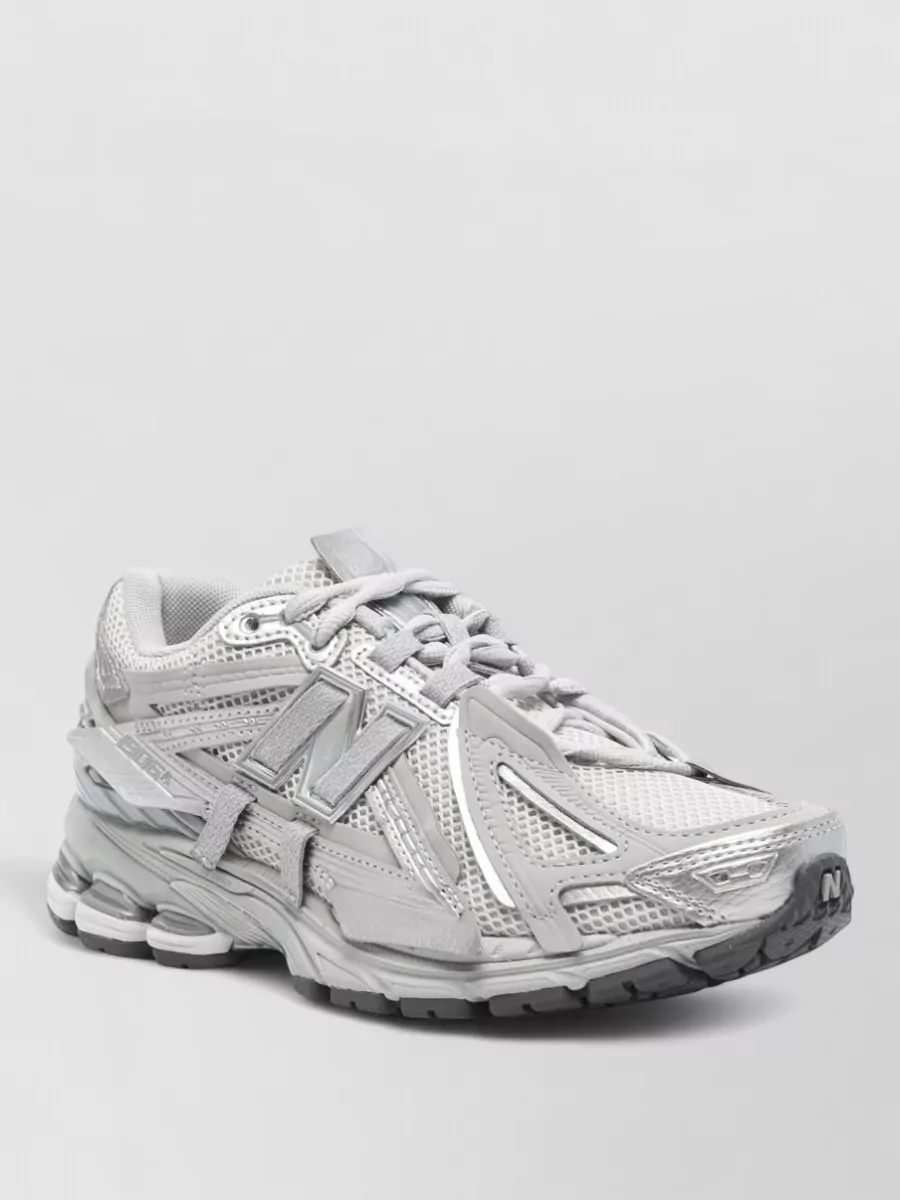 New Balance Paneled Low-Top Sneakers