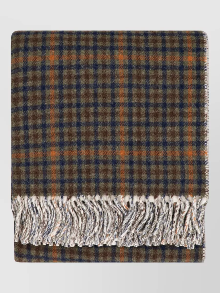 Autry Cotton blanket — The checked Autry scarf introduces subtle navy and rust accents that still sit within the brown family, adding seasonal texture and a collegiate twist without fighting the minimal lines.