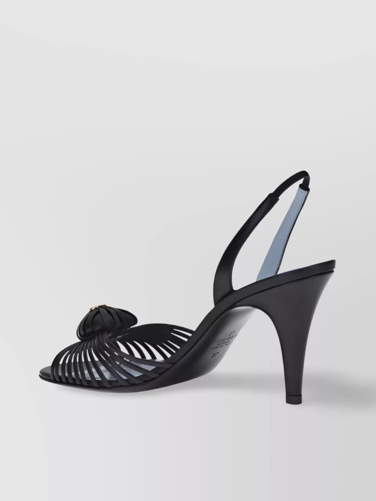 Valentino Garavani Leather heart slingback sandals | The