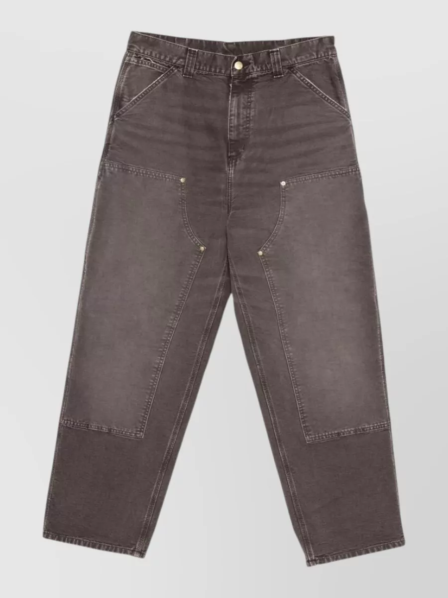 Carhartt Wip Straight-leg denim jeans — The relaxed tapered charcoal workwear denim mirrors the hoodie’s washed tone and utility feel while the roomy leg balances the regular-fit top and sits cleanly over sneakers.