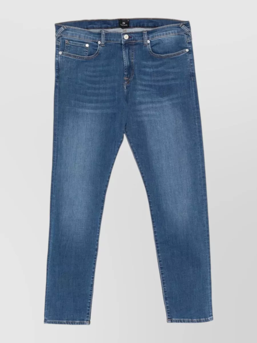 Paul Smith Denim jeans — The slim mid‑indigo Paul Smith denim keeps the outfit casual, minimalist and preppy, matching the tees’ palette and formality while giving a clean, regular silhouette just as the stylist card suggests.