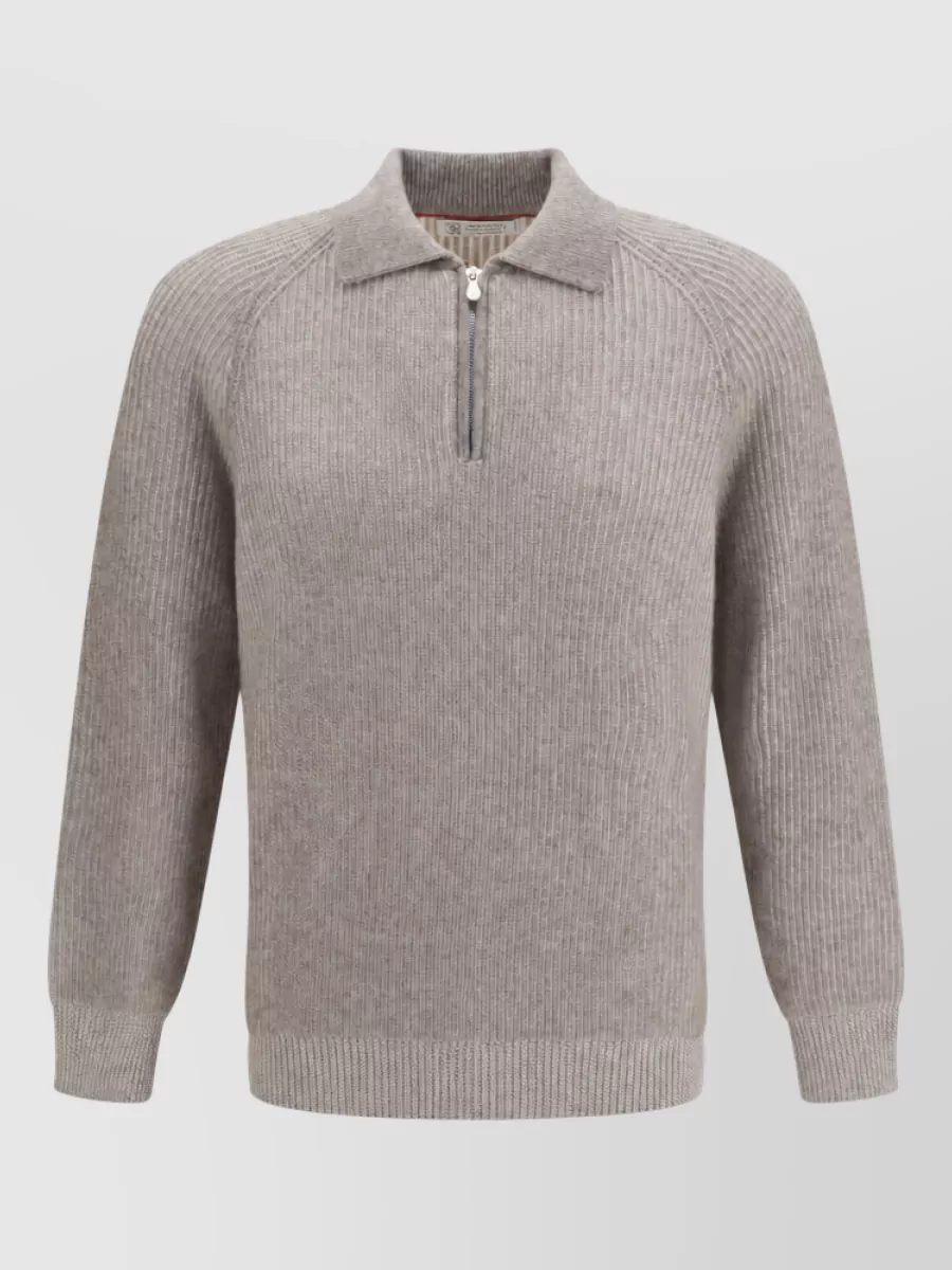 Brunello Cucinelli Cashmere milano stitch zip polo sweater — The taupe half zip gives a softer tonal contrast under the charcoal pea-coat, keeps the formality at relaxed-tailored, and echoes the quiet luxury palette suggested in the coat’s styling notes.