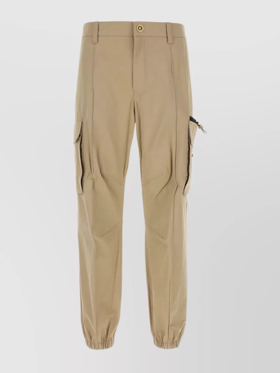 Shop Versace Cargo Trousers With Elastic Cuffs And Multiple Pockets In Beige