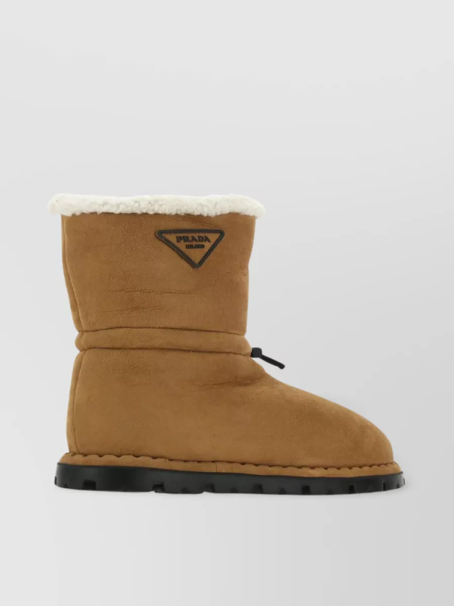Shop Prada Round Toe Shearling Ankle Boots In Brown