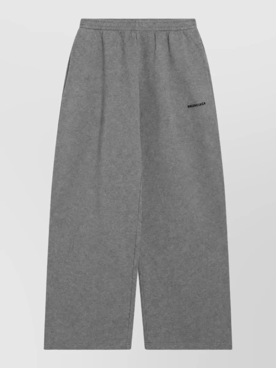 Balenciaga Loungewear top — The matching grey wide-leg Balenciaga pant creates a clean, monochrome streetwear set with the zip sweatshirt, keeping the vibe relaxed, minimal and travel ready.