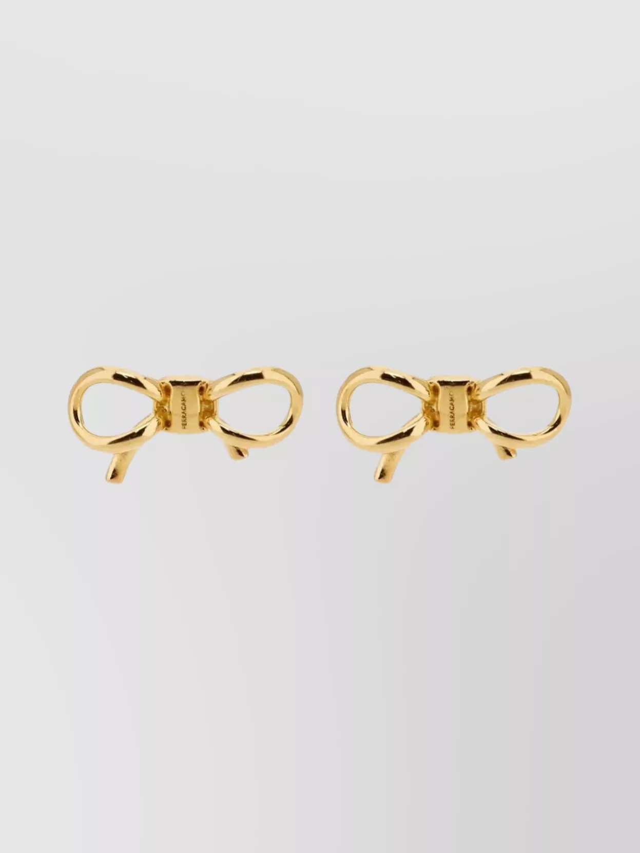 Ferragamo Stylish Bow Design Stud Earrings In Gold