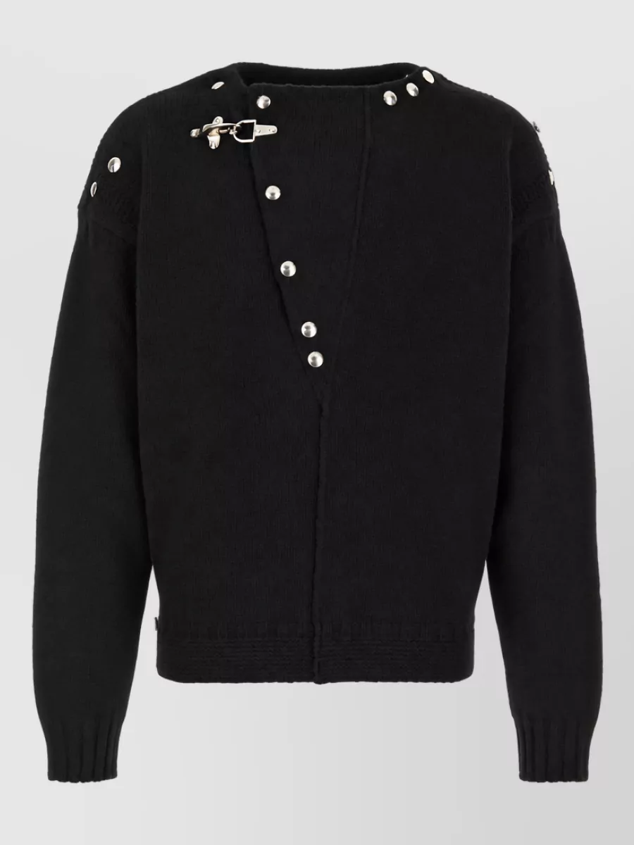 Marni Cashmere wool jumper — The studded, hardware-detailed knit mirrors the shirt-jacket’s studded collar and black-silver palette, creating a cohesive nocturnal story with a modern, slightly subversive edge.