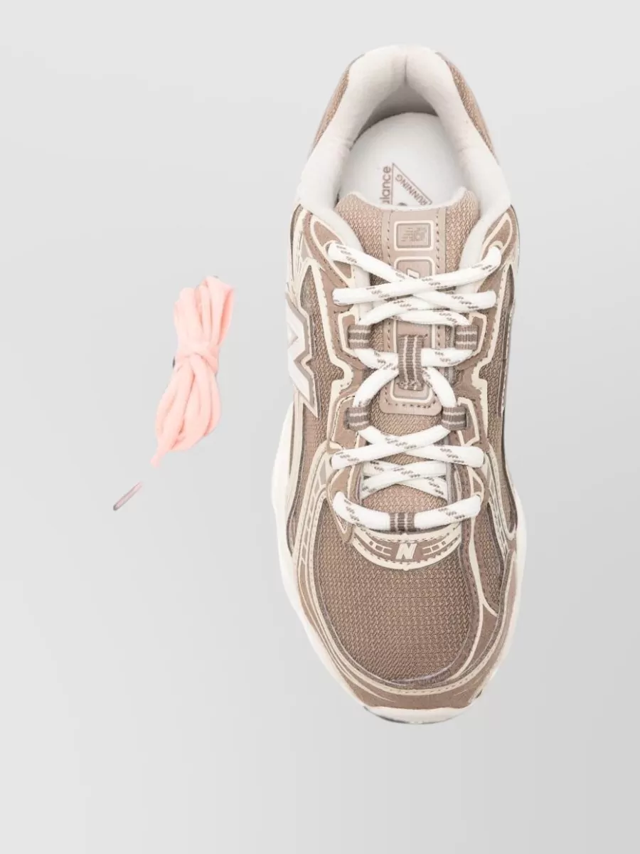 New Balance Leather Paneled Low-Top Sneakers