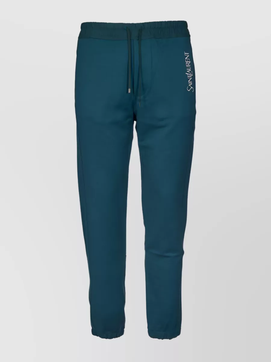 Shop Saint Laurent Embroidered Logo Drawstring Track Pants In Cyan